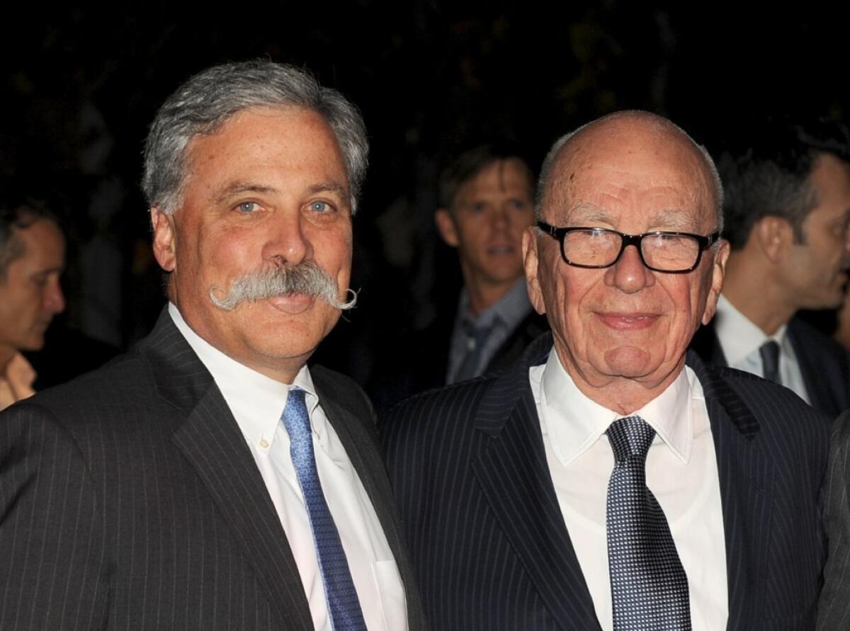 Shareholders of 21st Century Fox voted to return to the board Chief Operating Officer Chase Carey, left, and Chairman and Chief Executive Rupert Murdoch.