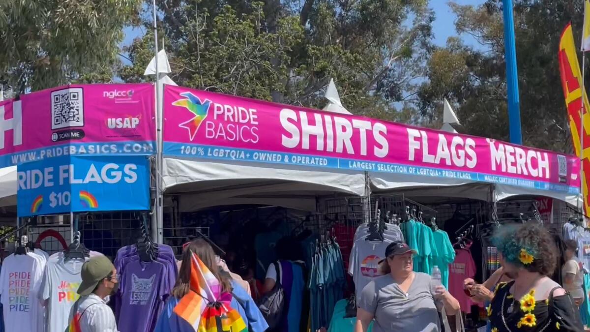 A still from the documentary short, "Priceless Pride," showing Pride month merchandise for sale