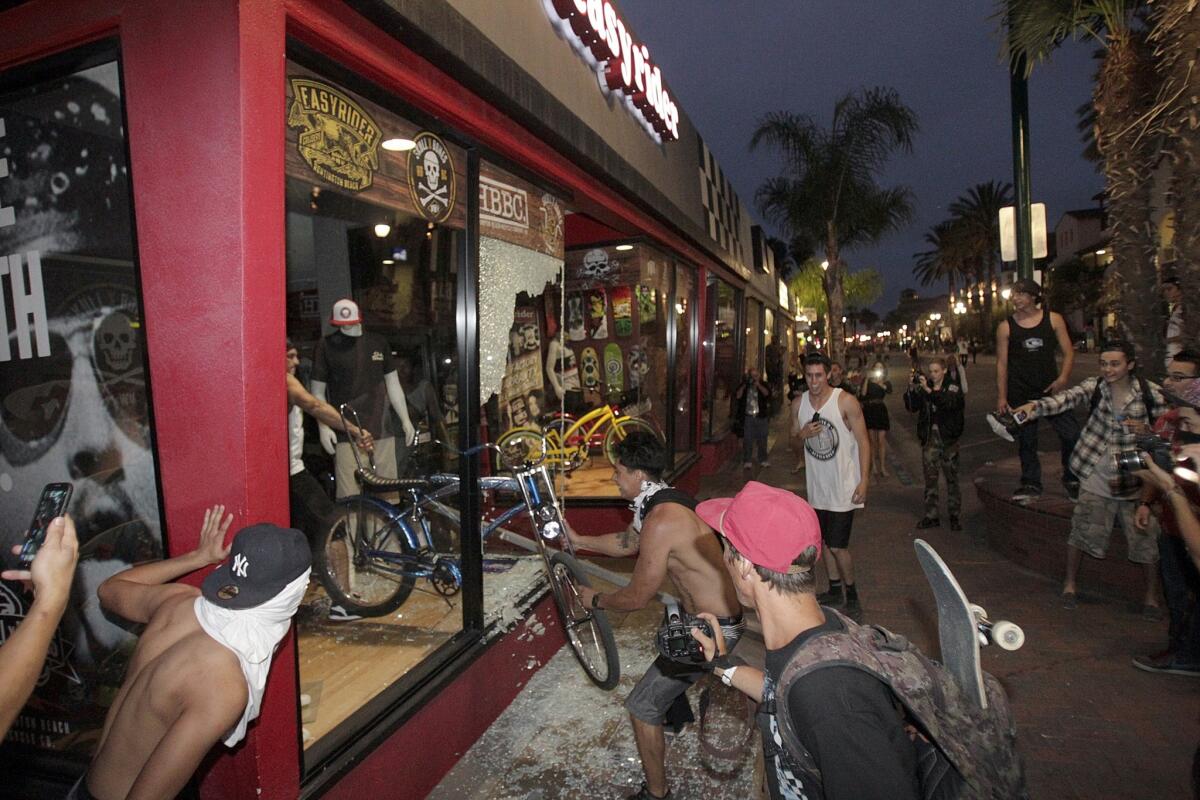 At least one bike was stolen Sunday night. Passersby persuaded others to stop looting.