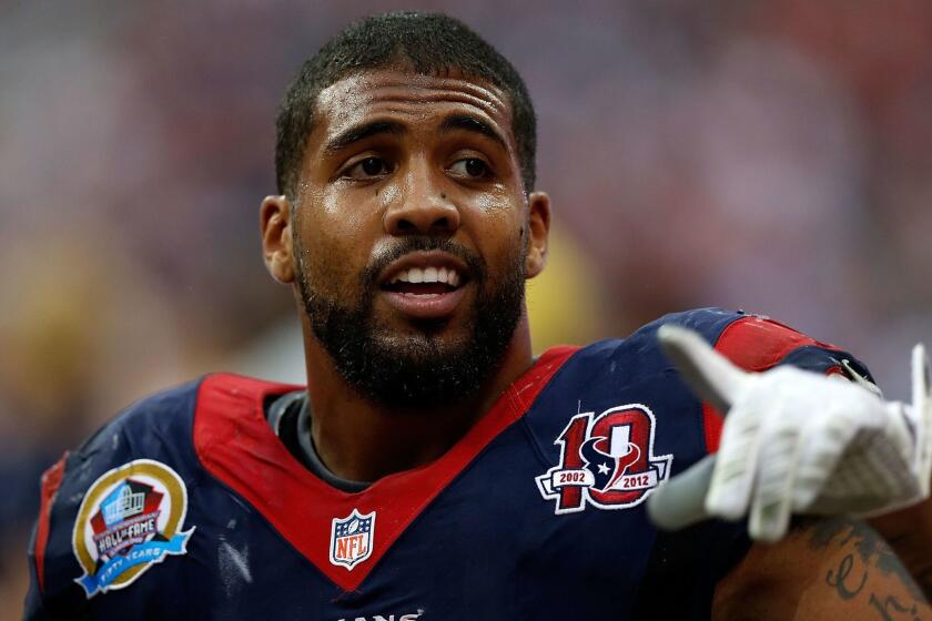 Arian Foster, shown in 2012, likes his chances in a one-on-one battle with a wolf.
