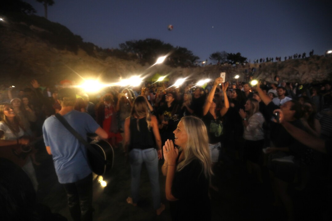 Jessi Green, foreground, and her husband Parker had been planning Saturate OC fore more than a year.