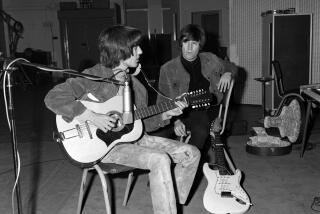 George Harrison plays John Lennon's Framus 12-string Hootenanny acoustic guitar.