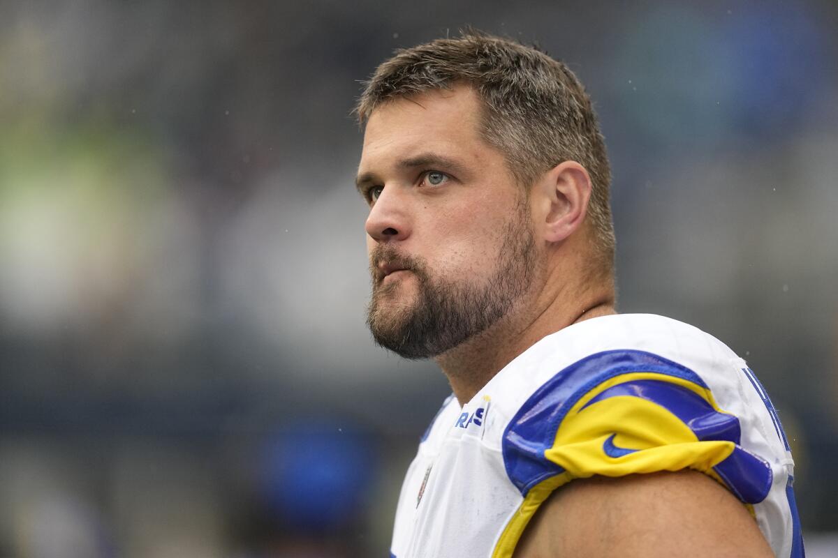 Rams right tackle Rob Havenstein stands on the field during a game.