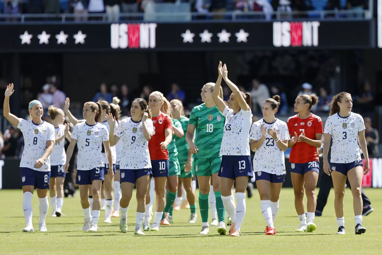 The United States women’s national team celebrates a win against Wales during a FIFA Women’s World Cup send-off soccer match.