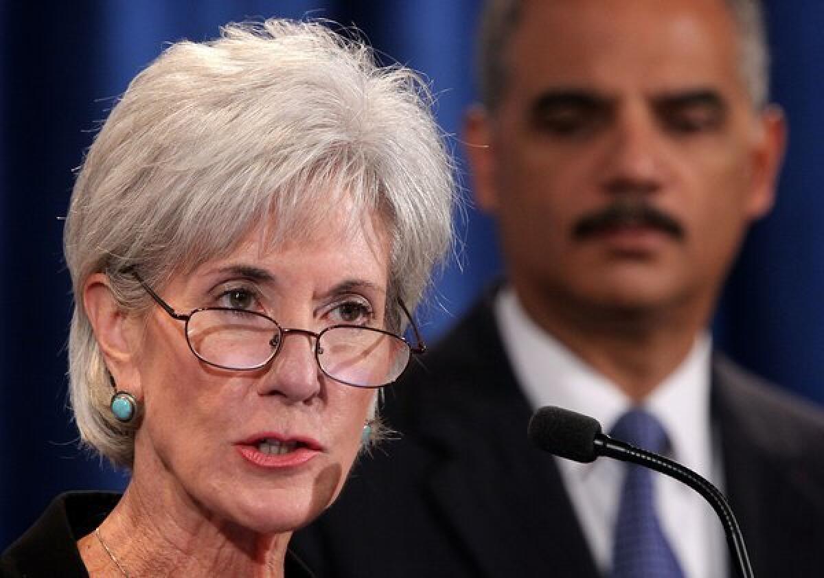 Health and Human Services Secretary Kathleen Sebelius speaks at a news conference.