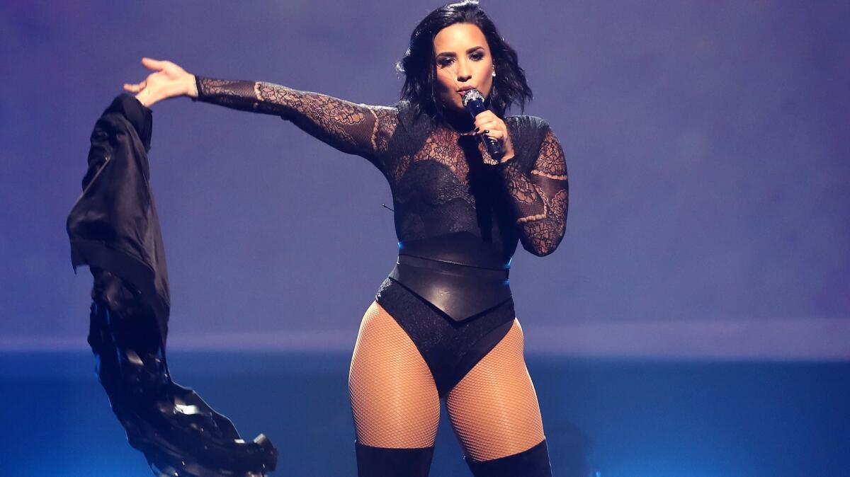 Demi Lovato performs at the TD Garden in Boston.