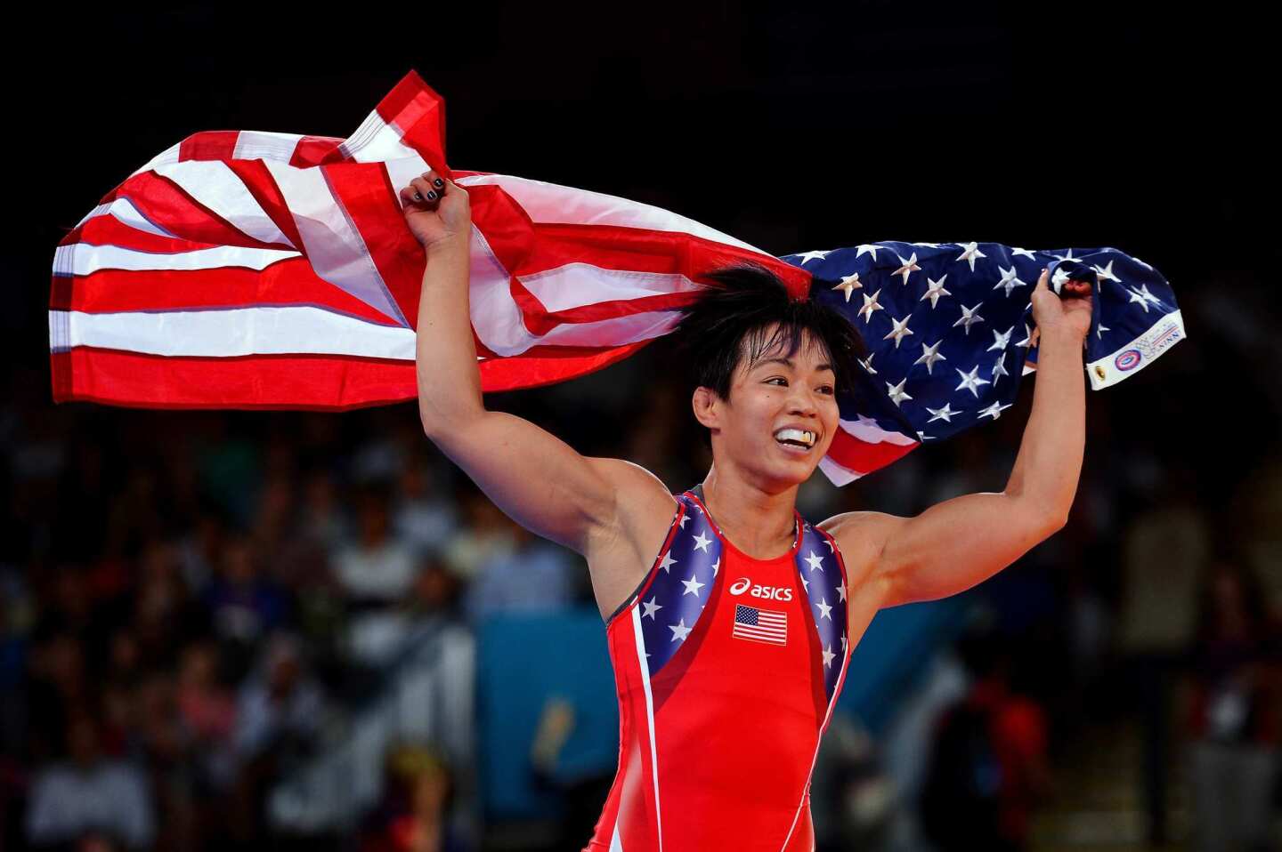 Clarissa Chun of the United States celebrates winning the bronze medal in the 105.5-pound class of women's freestyle wrestling Wednesday.