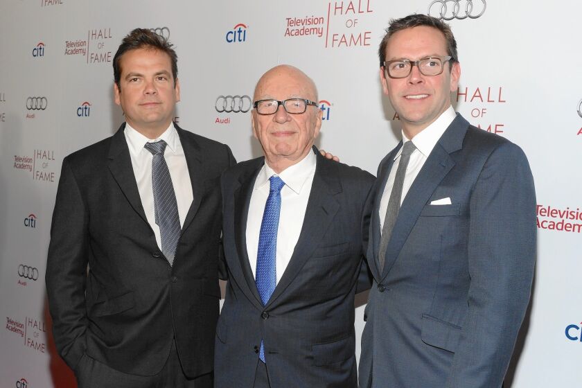 From left, Lachlan Murdoch, Rupert Murdoch and James Murdoch attend a Television Academy event at the Regent Beverly Wilshire Hotel last year. The elder Murdoch’s succession plan reflects his will to see his own blood run the company that he built.