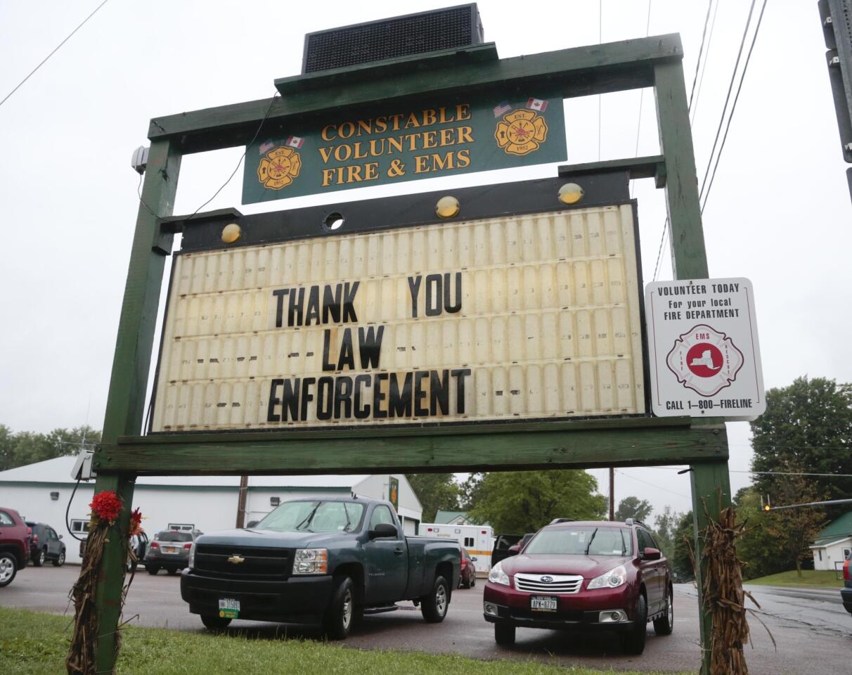 A sign at the Constable Volunteer Fire and EMS thanks law enforcement after the second of two escaped prisoners was apprehended June 28 in Constable, N.Y.