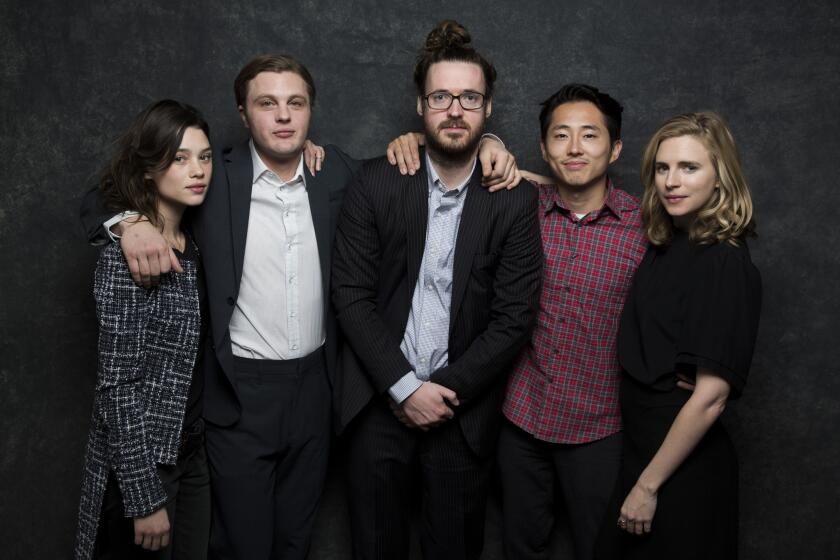 From left: Astrid Berges-Frisbey, Michael Pitt, Mike Cahill, Steven Yuen and Brit Marling at the 2014 Sundance Film Festival.