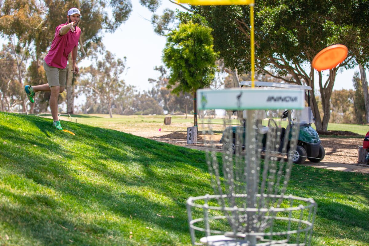 Brodie Smith practices putting in preparation for this weekend's pro disc golf tournament 