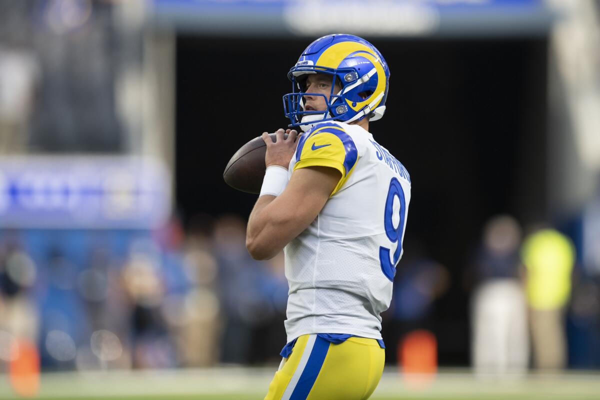 Rams quarterback Matthew Stafford warms up before a win over the Chicago Bears on Sept. 12.