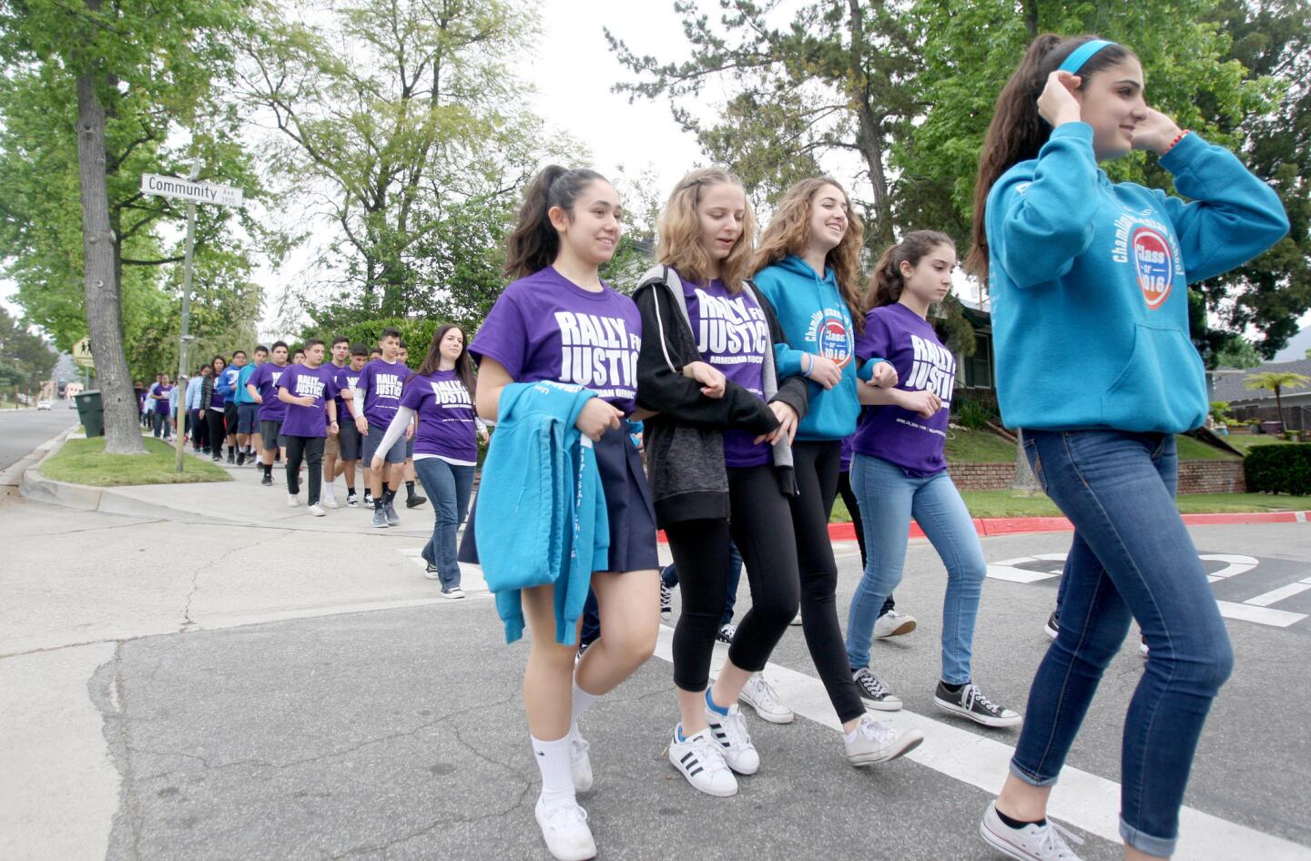 Chamlian Armenian School seventh- and eight-grade students participate in the annual Armenian Genocide Commemorative Walk to the Armenian Western Prelacy Headquarters, in La Crescenta on Thursday, April 7, 2016. At the headquarters, the students laid down carnations at an Armenian Genocide Memorial.