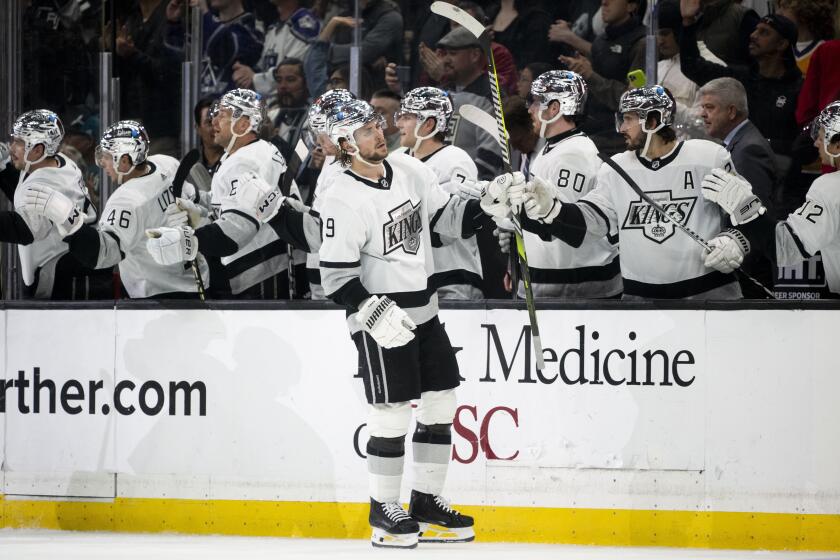 Los Angeles Kings right wing Adrian Kempe (9) is congratulated for his goal against the San Jose Sharks.