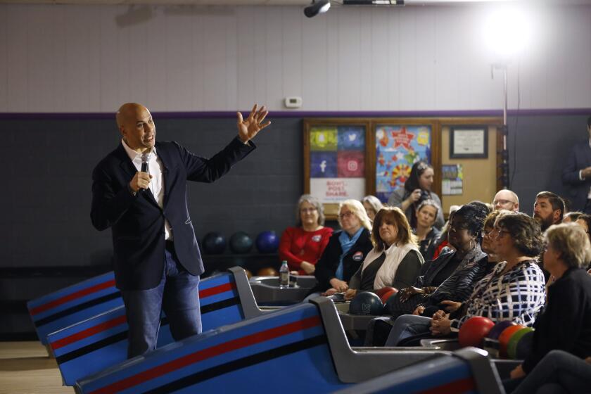 Democratic presidential candidate Sen. Cory Booker, D-N.J., speaks during a meet and greet at the Adel Family Fun Center, Friday, Dec. 20, 2019, in Adel, Iowa. (AP Photo/Charlie Neibergall)
