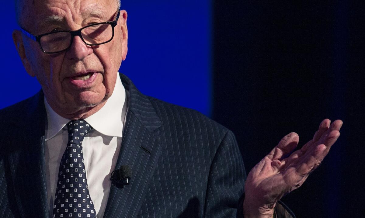 Rupert Murdoch, seen here at The Wall Street Journal CEO Council in Washington, D.C., is expected to relinquish his chief executive role at Fox but remain actively involved in the company. Shares of the media company fell Thursday as the succession plan for Murdoch began to become more clear.