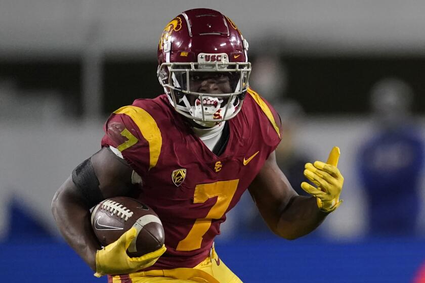 Southern California running back Stephen Carr (7) runs the ball during the second half.
