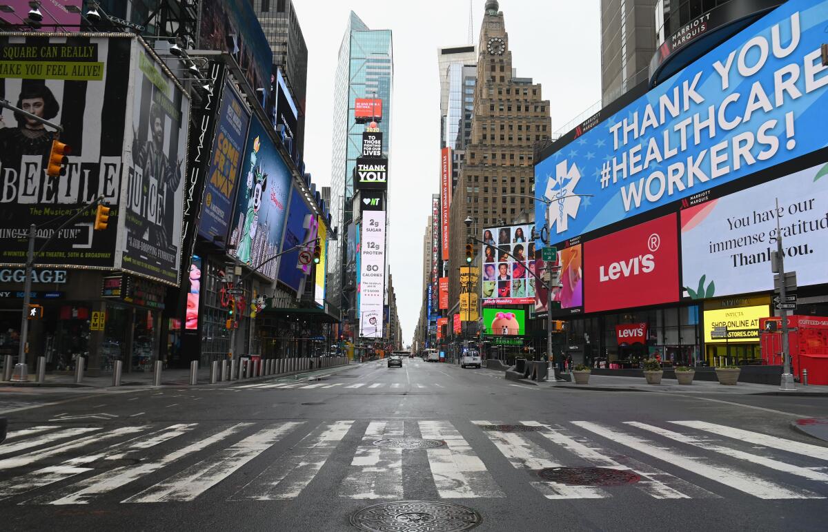 New York's Times Square is virtually empty on Friday.