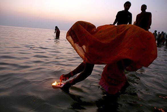 Hindu pilgrims gather for the annual Ganga Sagar Fair on the Bay of Bengal, about 85 miles south of Kolkata. Thousands of devotees from India and beyond gather at the point where the holy river Ganges meets the sea, to take a dip and wash away earthly sins.