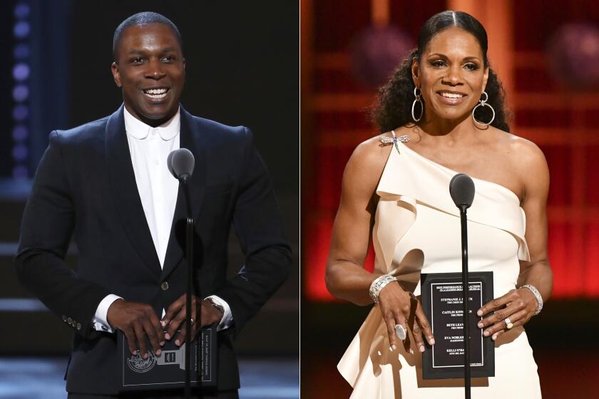 Leslie Odom Jr. presents an award at the 72nd annual Tony Awards in New York on June 10, 2018, left, and Audra McDonald presents an award at the 73rd annual Tony Awards in New York on June 9, 2019. Producers of the Tony Awards telecast announced Monday that McDonald will host the award ceremony on Sept. 26, followed by a two-hour celebration of Broadway's return, hosted by Odom. The bulk of the Tonys will only be accessible to Paramount+ customers while Odom's special, which will award the three top awards: best play, best play revival and best musical, will air on CBS. (AP Photo)