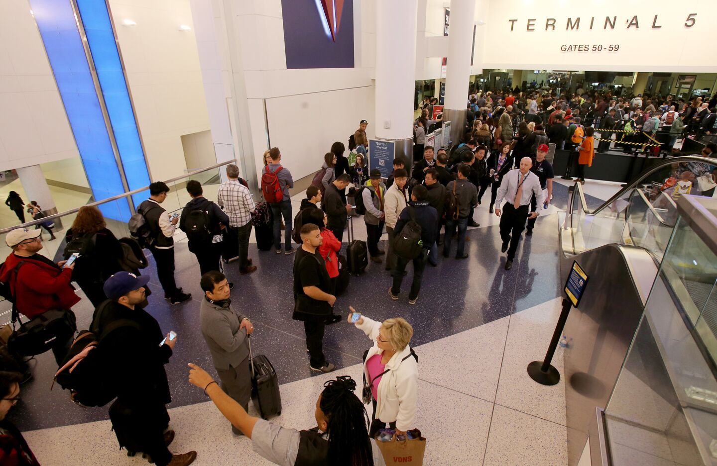 Security screening lines in Terminal 5 at LAX back up after unattended baggage was found in a restroom on Wednesday.