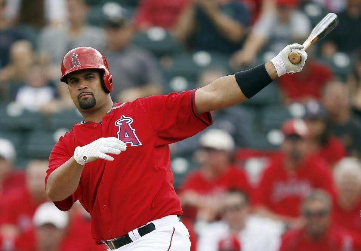 Albert Pujols lines a foul ball into the seats against the Chicago Cubs in Tempe, Ariz.