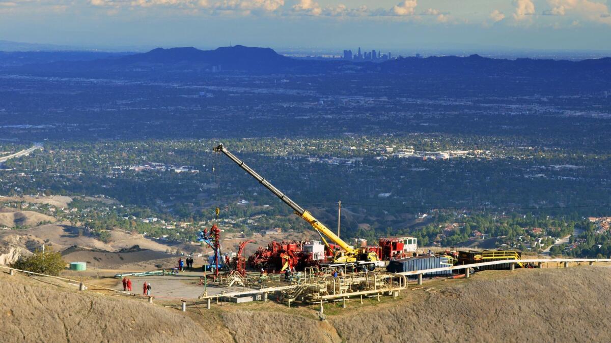 Crews work to stop the flow of natural gas from the Aliso Canyon storage facility near Los Angeles in November 2015.
