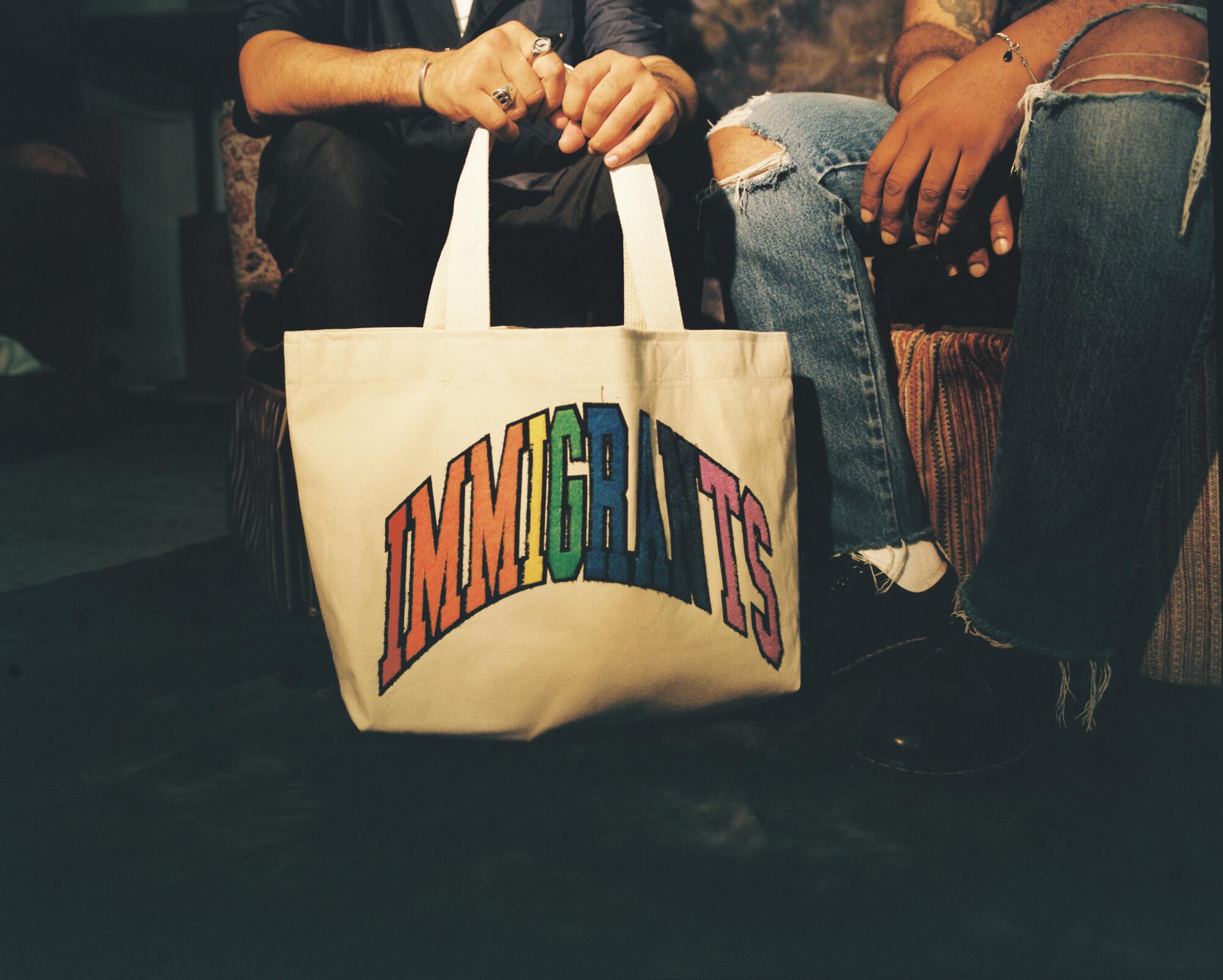 Kids of Immigrants Immigrants Tote Bag in Natural Multi, $50, Sold Out.