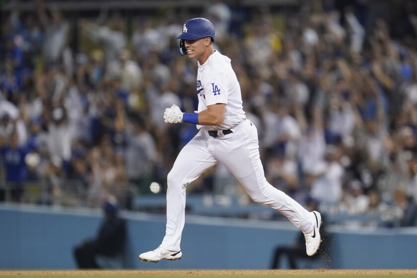 Jake Lamb of the Dodgers walks around the bases after a tied home run in the seventh inning on July 9, 2022.
