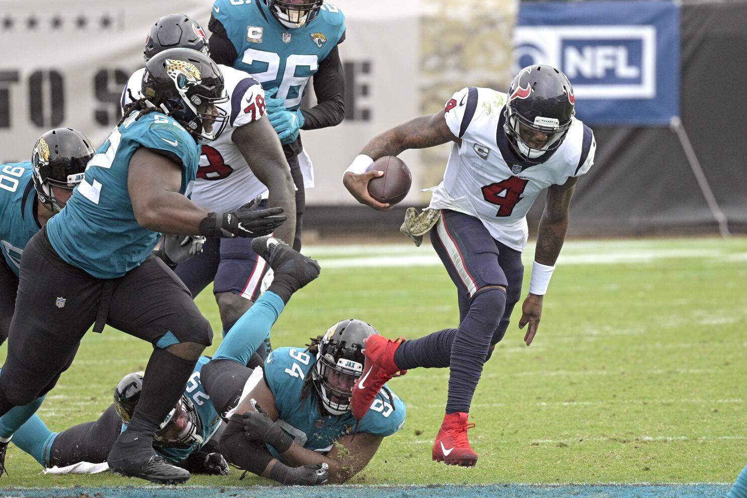 Houston Texans quarterback Deshaun Watson (4) scrambles during the