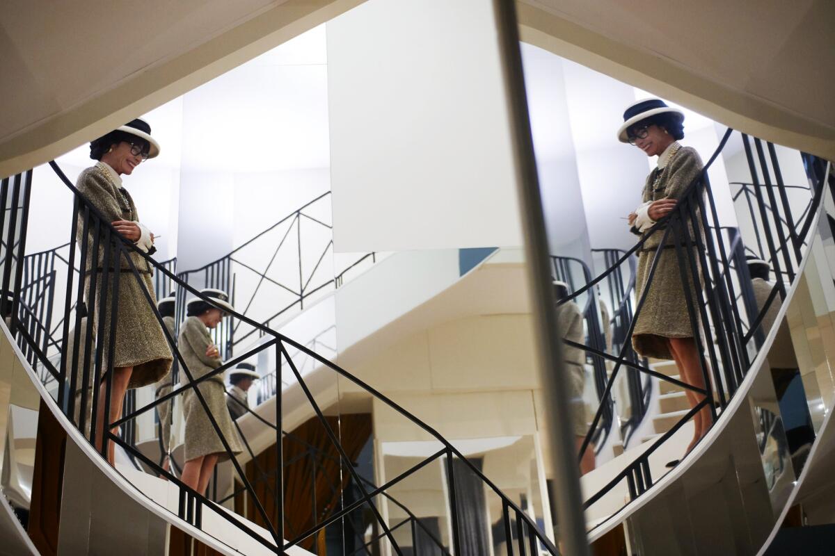 Geraldine Chaplin, portraying Coco Chanel on a mirrored staircase in "The Return," a film written and directed by Karl Lagerfeld.