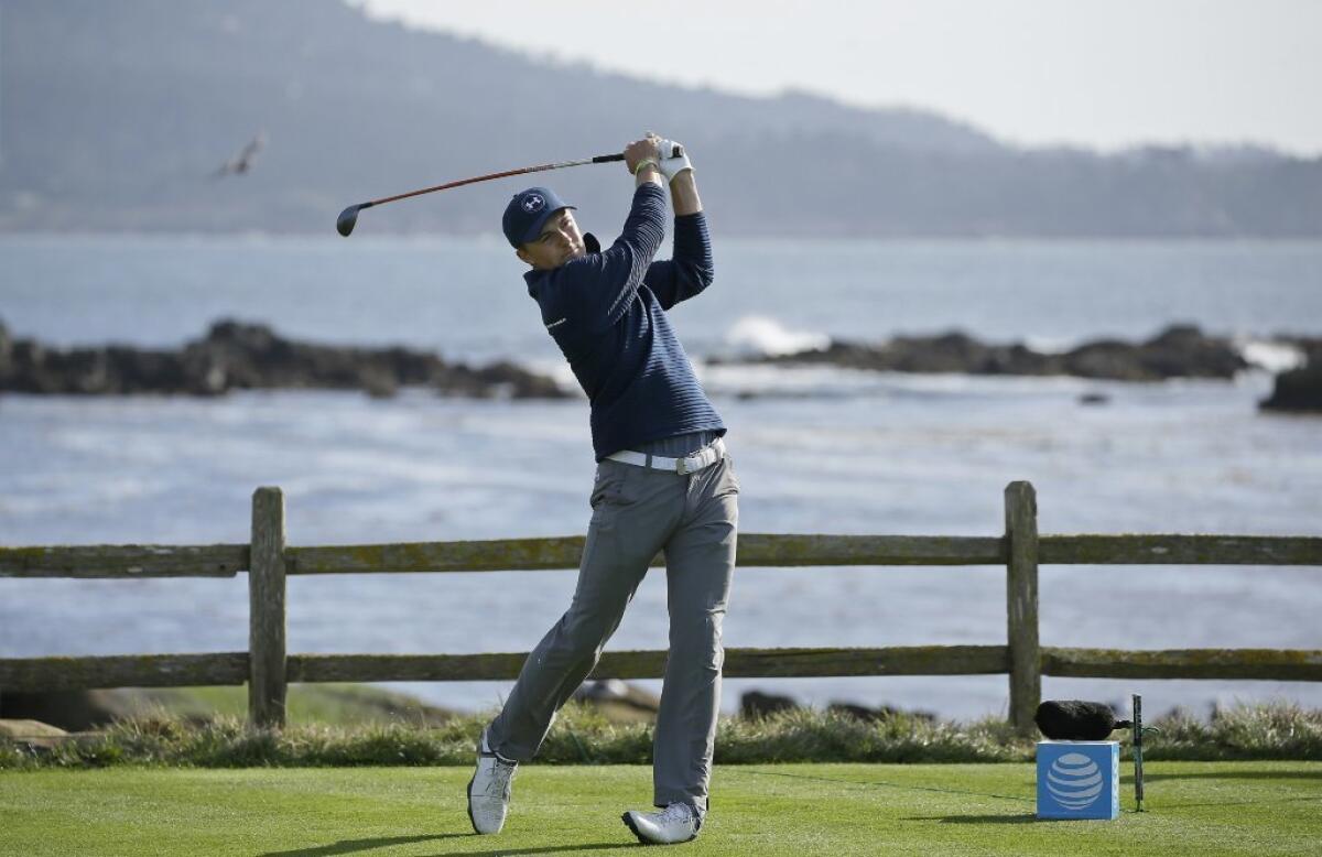 Jordan Spieth hits from the 18th tee Sunday on the way to winning the AT&T Pebble Beach National Pro-Am.