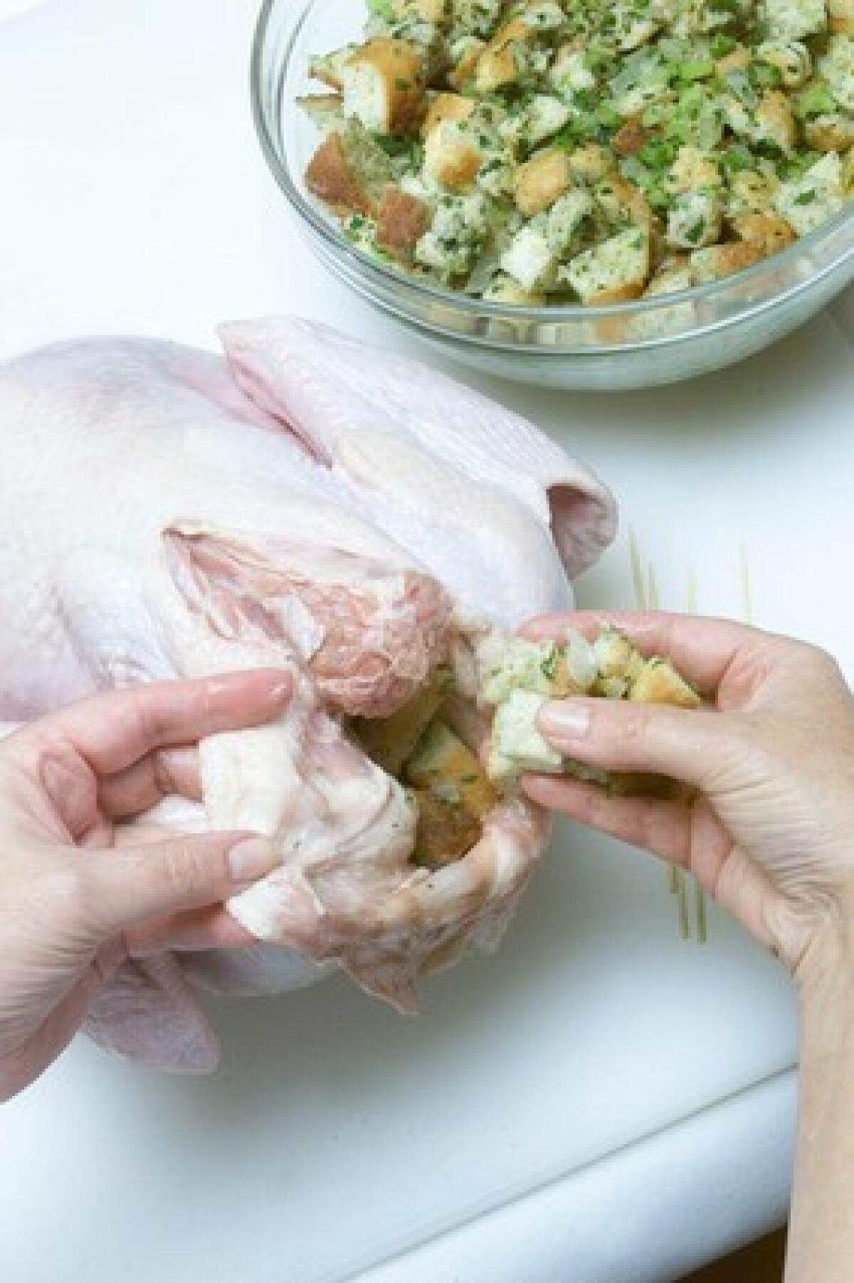 STUFFING: Place stuffing in neck.