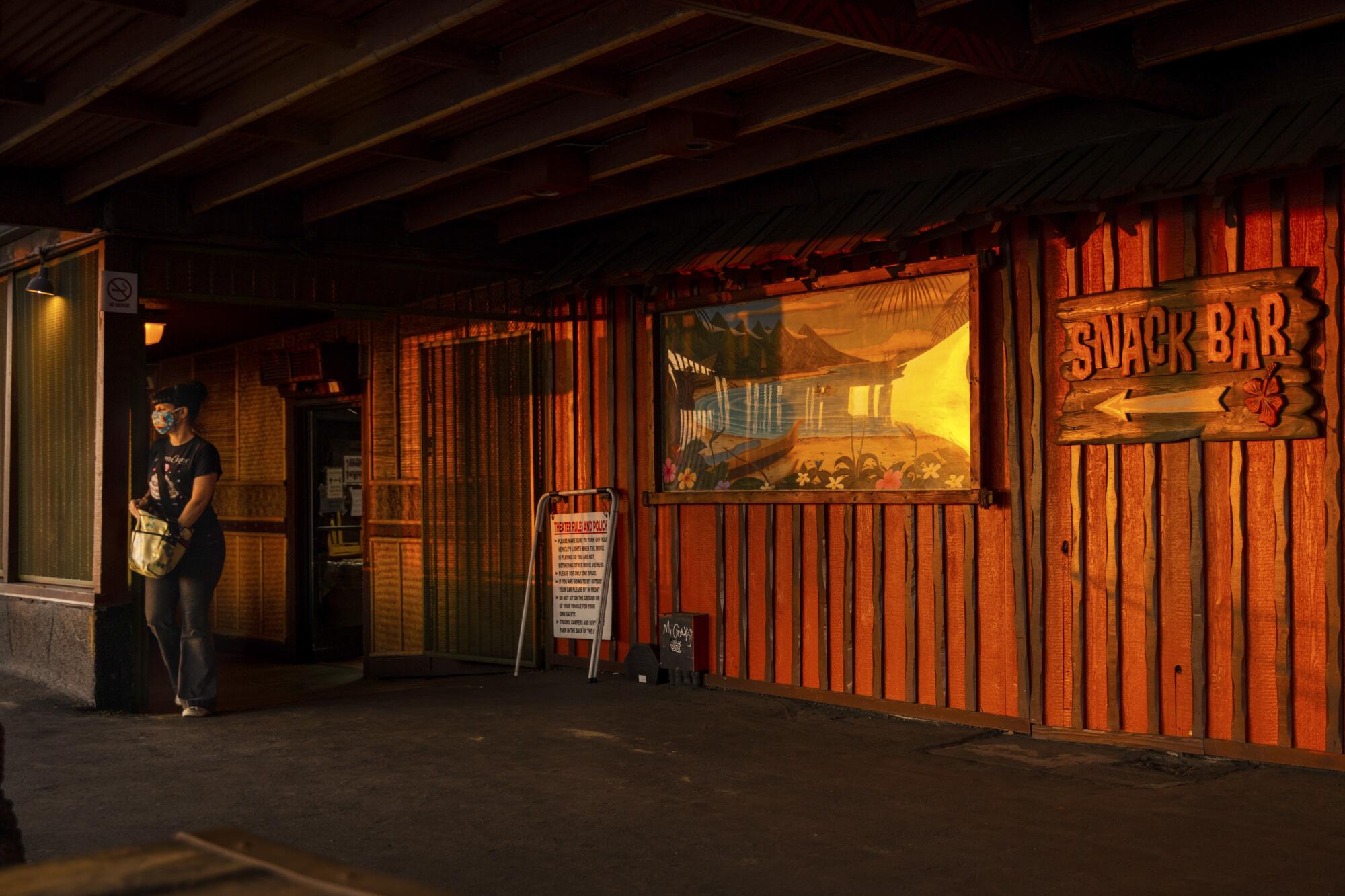 The tiki theme pervades throughout the central building housing the restrooms, snack bar and projectors at the Mission Tiki Drive-in Theatre in Montclair.