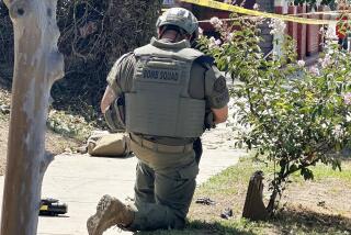 The Los Angeles County Sheriff's SEB Tactical Bomb Tech on scene, where four hand grenades in a Baldwin Park neighborhood on Aug. 22.The cache of grenades were found in the 13800 block of Los Angeles Street just after 10:30 a.m. by a gardener working in the area.