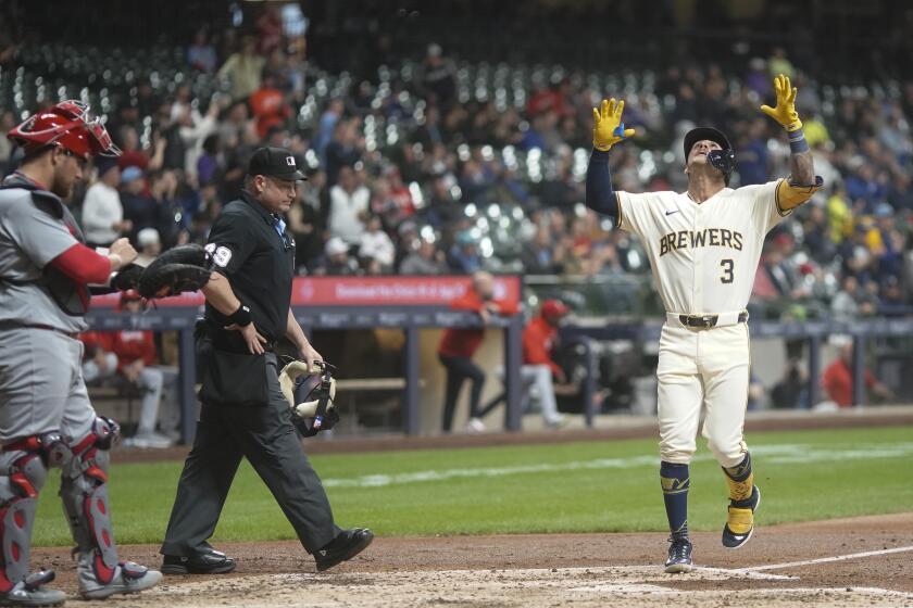 Milwaukee Brewers' Joey Ortiz reacts after hitting a home run during the fourth inning of a baseball game against the St. Louis Cardinals Thursday, May 9, 2024, in Milwaukee. (AP Photo/Morry Gash)