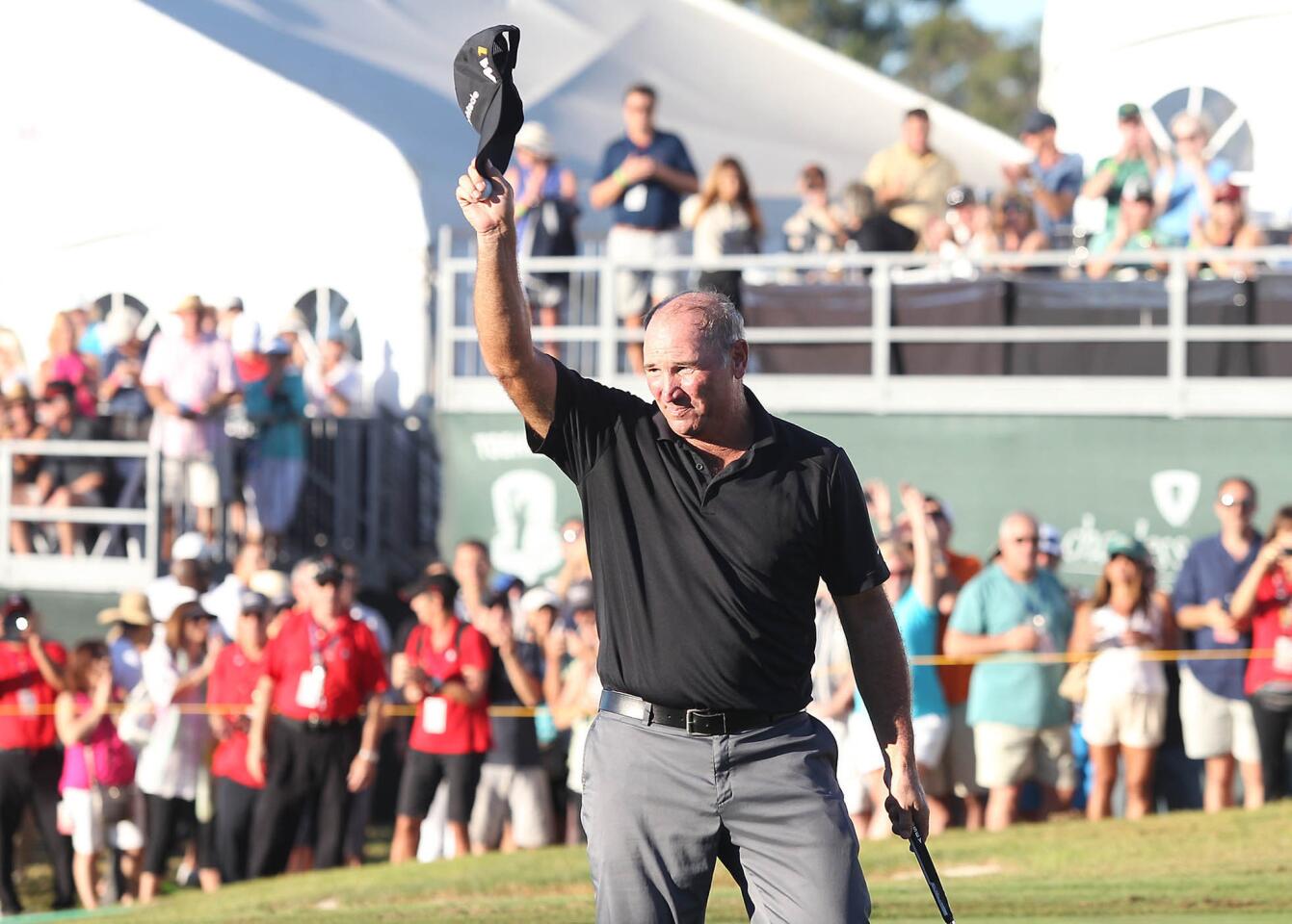 Duffy Waldorf salutes the gallery on the 18th green after winning the Toshiba Classic at the Newport Beach Country Club on Sunday.