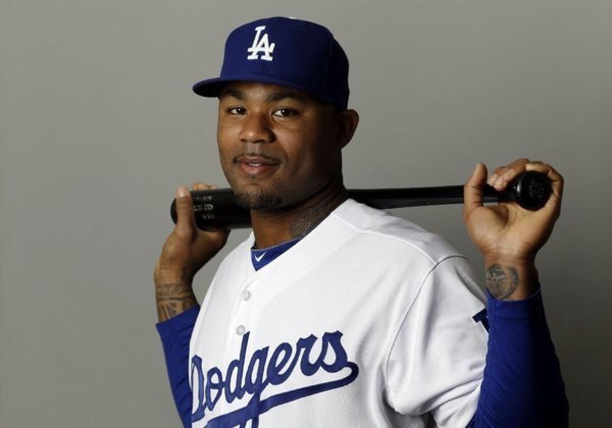 Carl Crawford will sit out at least a week of spring training games because of nerve irritation following his Tommy John elbow surgery.
