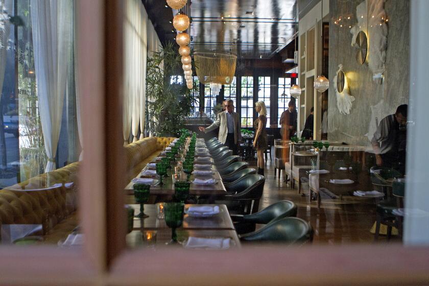 The grand dining room at downtown's Faith & Flower, named one of the best new restaurants in America by Esquire magazine.