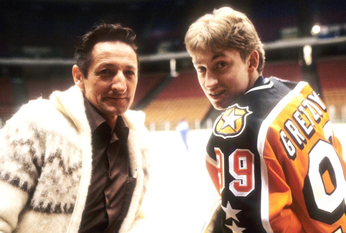 Wayne Gretzky and his father, Walter Gretzky, in 1984