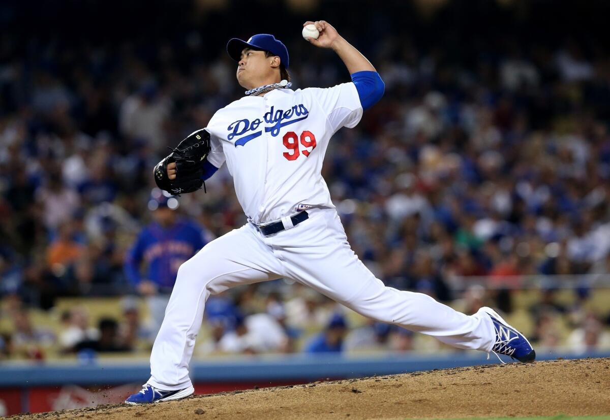 Rookie starter Hyun-Jin Ryu delivers a pitch during the Dodgers' 4-2 victory over the New York Mets on Tuesday.