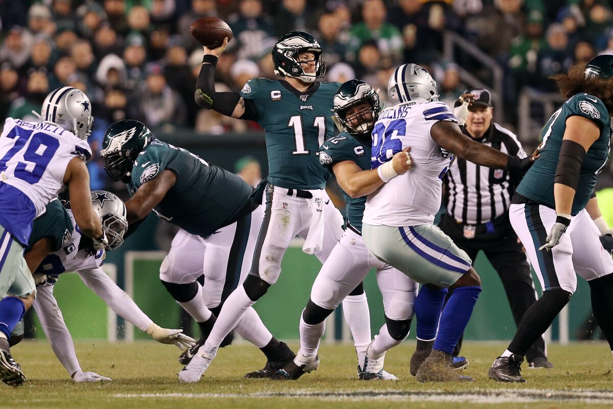 Philadelphia Eagles quarterback Carson Wentz passes against the Dallas Cowboys on Sunday.