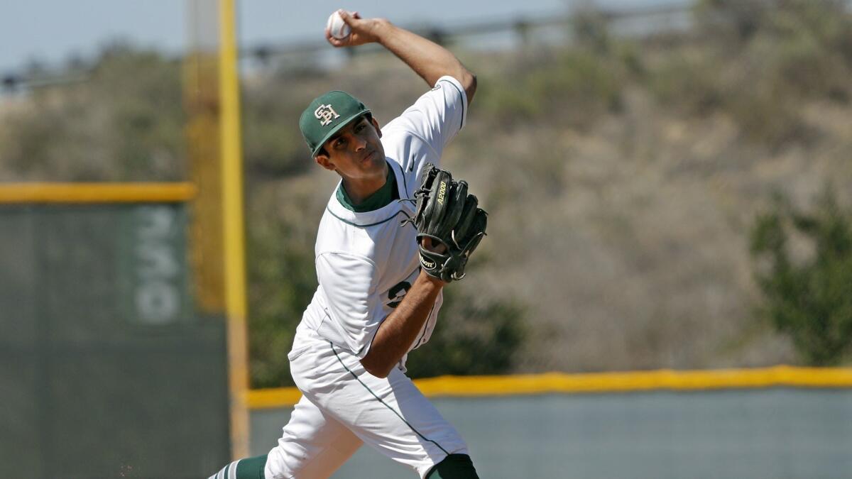 Sage Hill School starter Ashwin Chona pitches against Long Beach Poly in the first inning of a CIF Southern Section Division 3 wild-card playoff game on Wednesday.
