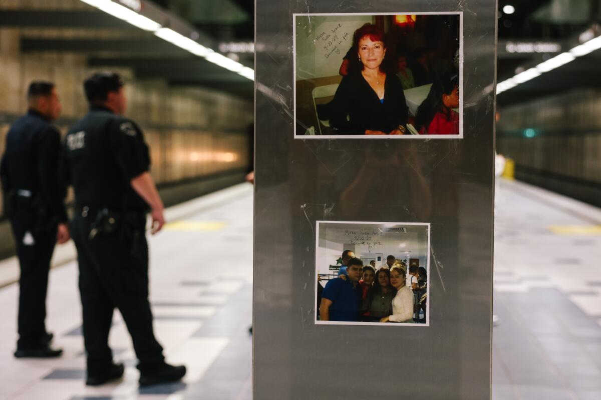 Family photos of a woman are posted on a subway platform.