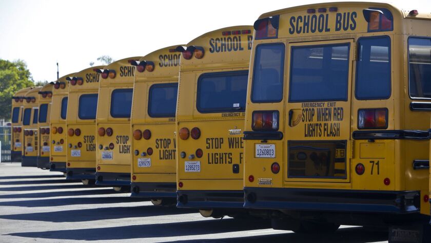 The Oceanside Unified School District buses. The district is at risk of fiscal insolvency, according to a state report. 