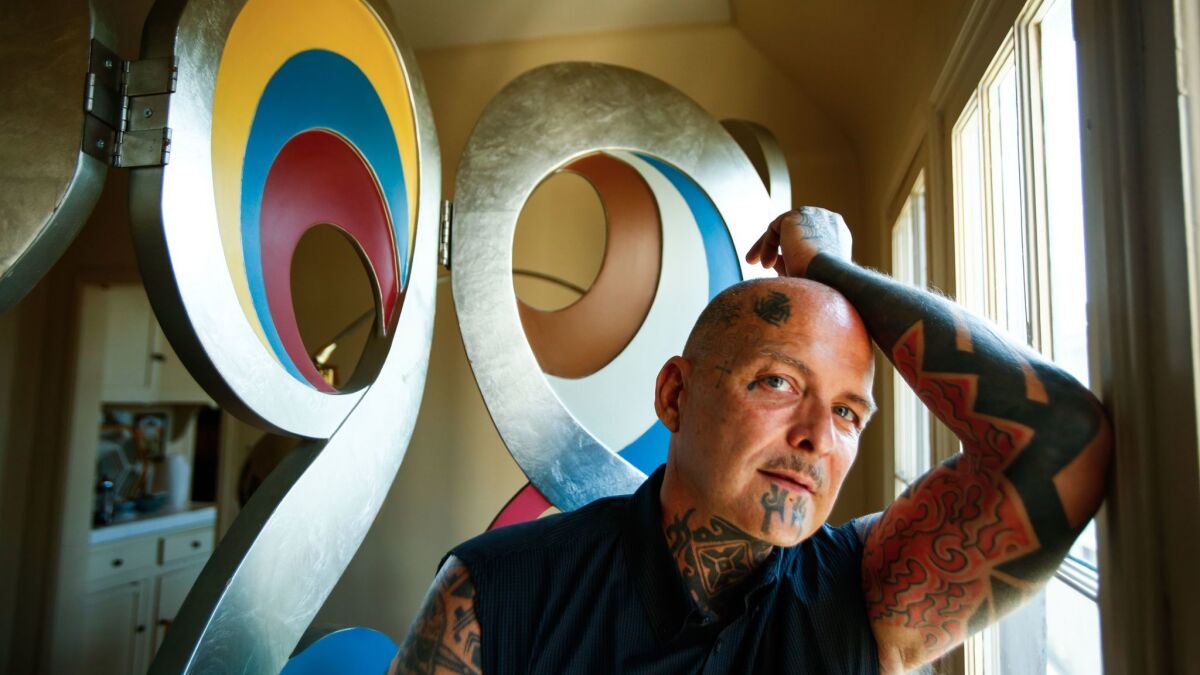 Ron Athey at home in Silver Lake. (Claire Hannah Collins / Los Angeles Times)