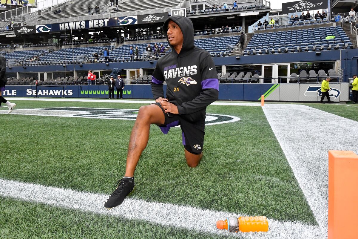 Baltimore Ravens cornerback Marcus Peters warms up before a game against the Seattle Seahawks on Oct. 20.