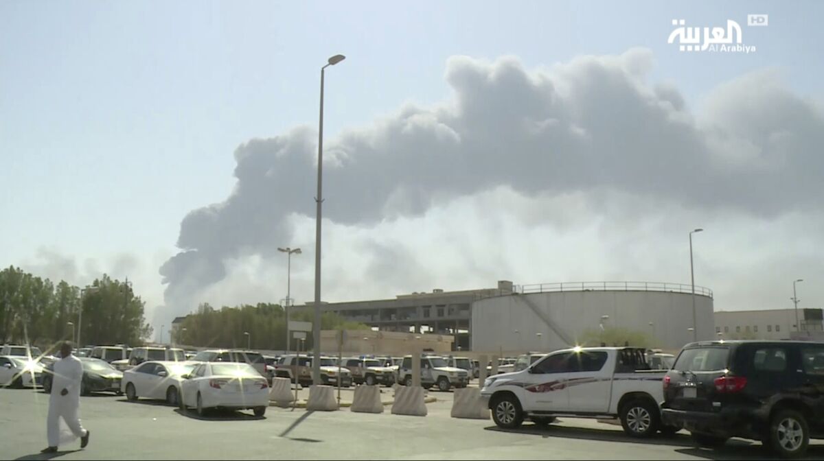 Smoke rises from a fire at the Abqaiq oil processing facility in Buqyaq, Saudi Arabia, on Sept. 14.