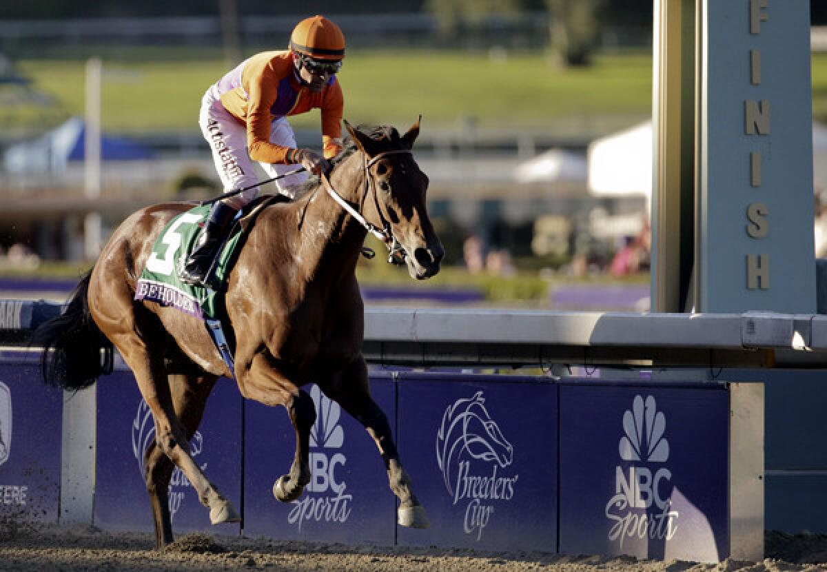 Beholder, with Gary Stevens aboard, breezes to victory in the Breeders' Cup Distaff on Friday at Santa Anita Park.