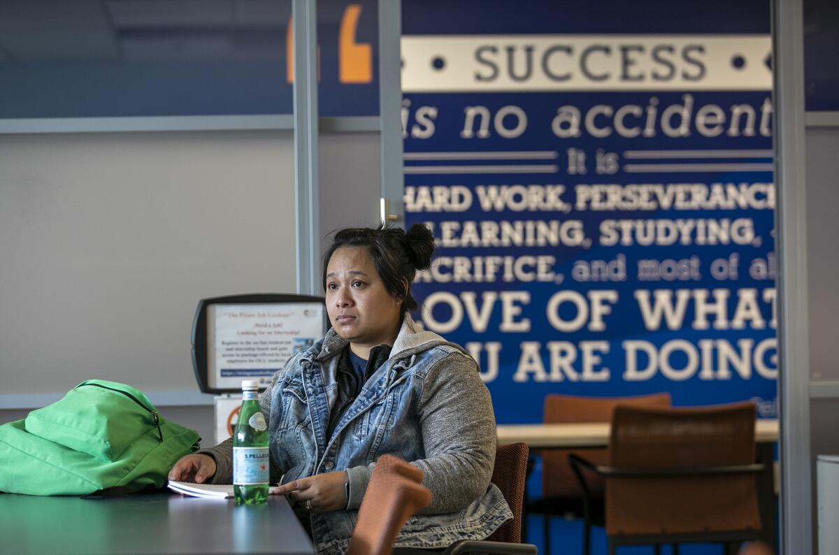  Hannah Bui attends a career coaching session at Orange Coast College on Wednesday.